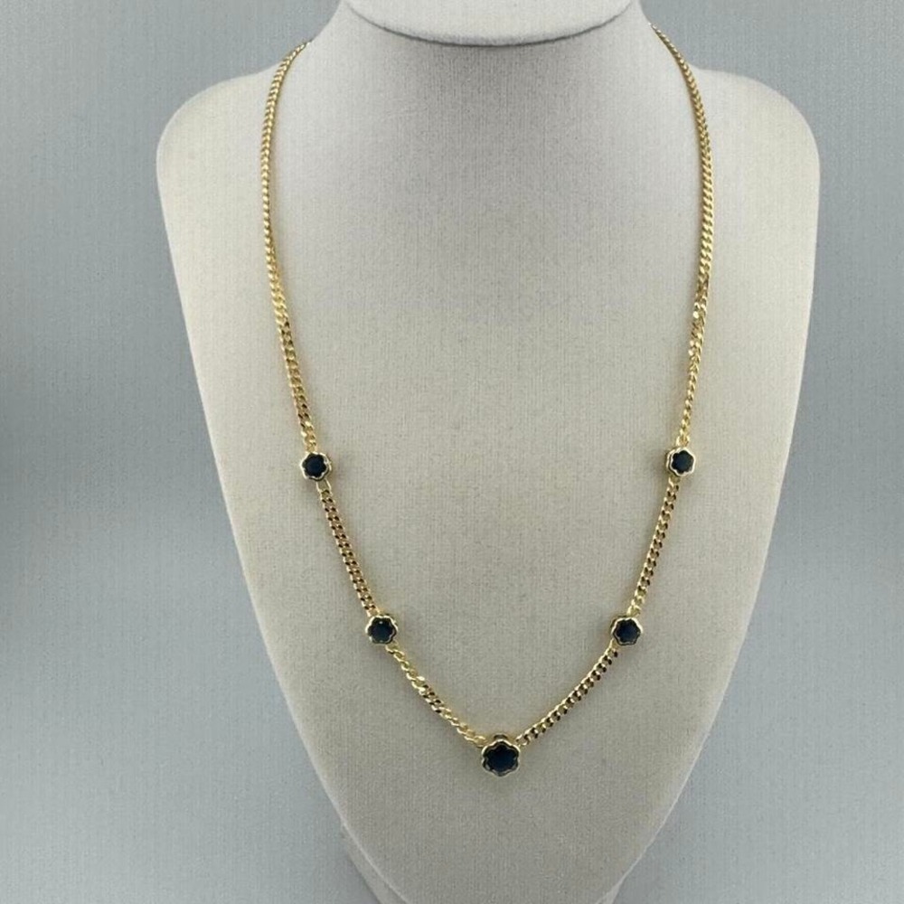 Gold flower necklace with blue crystal